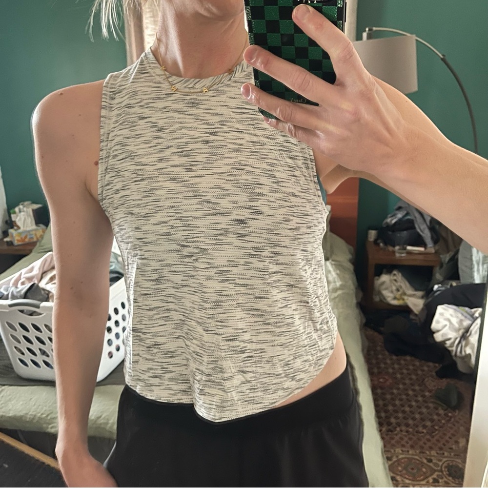 Lululemon Ultralight Tank
Open cross-back style 
Size 8